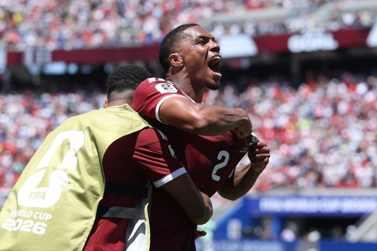 SANTA CLARA, CALIFORNIA - JUNE 13: Pedro Miguel #2 of Qatar celebrates the team's first goal by Boualem Khoukhi #16 during the FIFA World Cup 2026 Group B match between Qatar and Switzerland at San Francisco Bay Area Stadium on June 13, 2026 in Santa Clara, California. (Photo by Emilee Chinn/Getty Images)